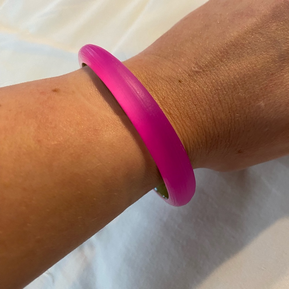 Alexis Bittar pink thin lucite tapered bangle